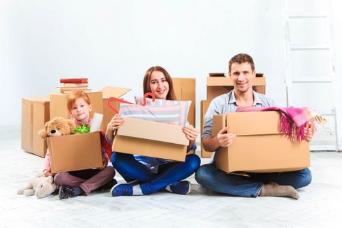 Removal team planning a house move in Hampstead with boxes and furniture