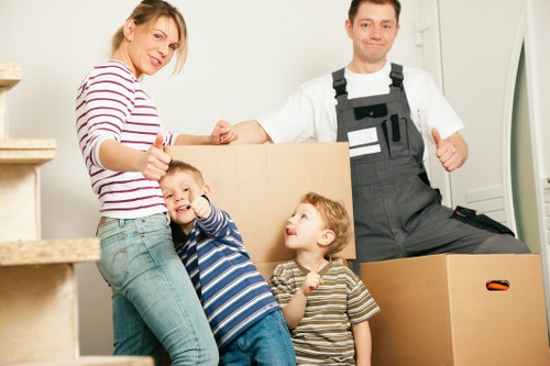 Office furniture and equipment being prepared for a Hampstead business move